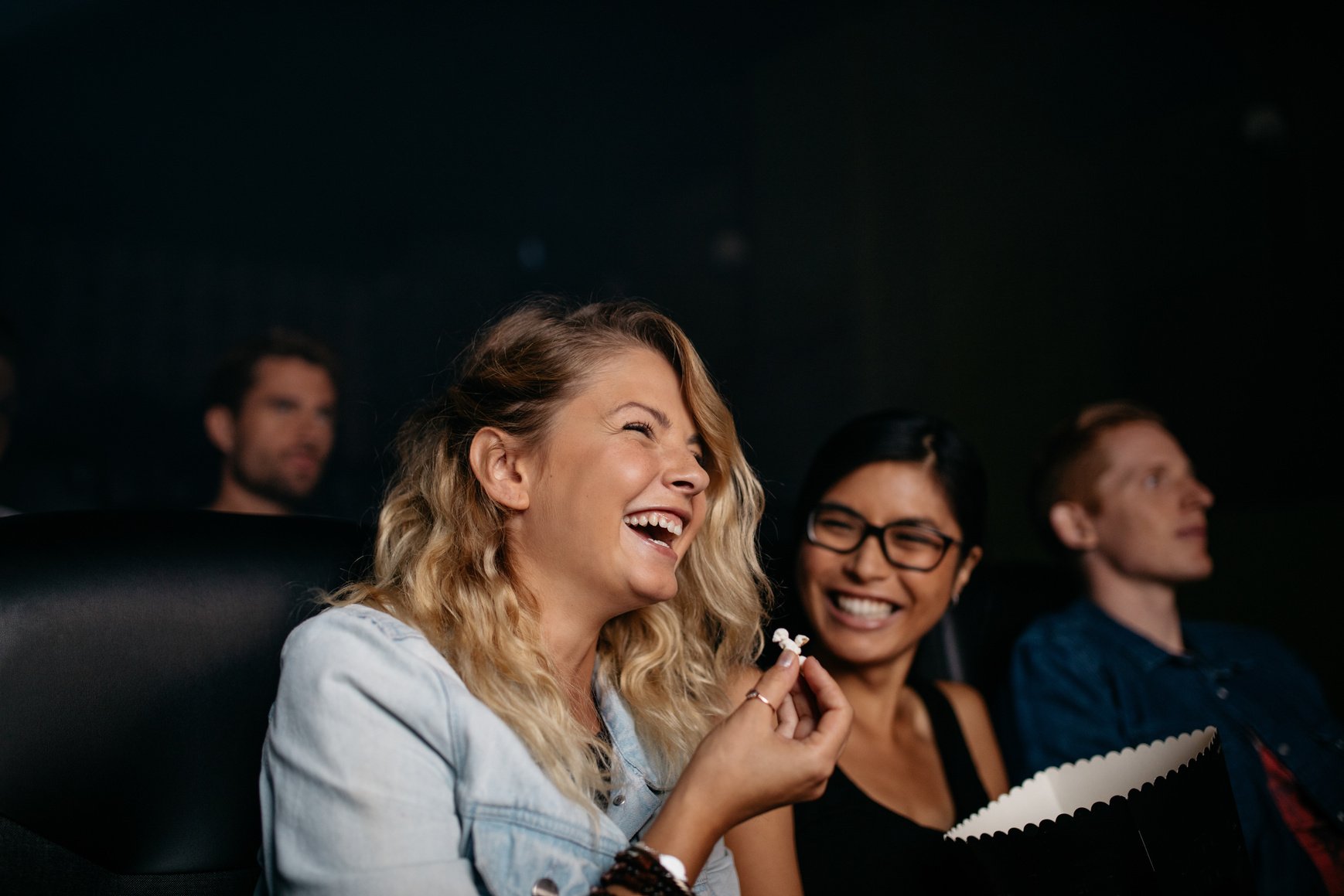 Girls Laughing and Watching Comedy Movie